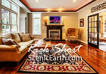western art on display over a fireplace in a living room